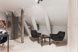 Family Apartment | Premium bedding, down comforters, blackout drapes, iron/ironing board