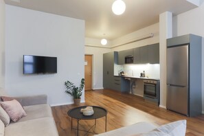 Deluxe Apartment | Living area | 32-inch Smart TV with digital channels, TV - Foundry Hotel Apartments (Uppsala)