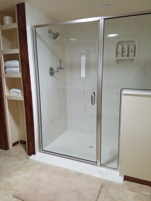 Combined shower/tub, hair dryer, towels, soap
