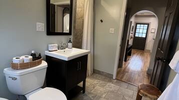 Bathtub, hair dryer, towels, soap