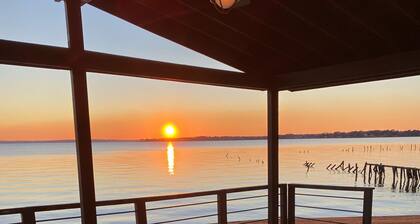 Lake front property on 3 acres offering privacy and never ending views.