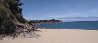 Large stone house in a green setting