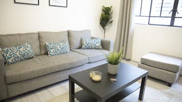 King Apartment | Zona de estar