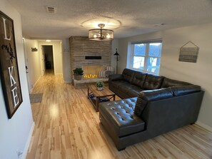 Smart TV, fireplace, books, music library