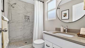 Combined shower/bathtub, hair dryer