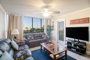 Condo, 2 Queen Beds, Pool Access | Living area | 40-inch TV with cable channels