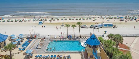 On the beach, sun loungers, beach towels