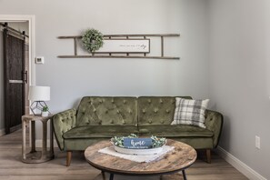 Deluxe Apartment | Living area | 50-inch Smart TV with digital channels, TV, Netflix - Madison Square (Amarillo)