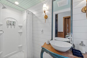 Combined shower/tub, hair dryer, towels, soap