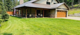 Modern and spacious cabin nestled along the banks of Elk Creek.