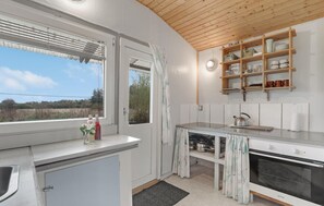 Fridge, stovetop, coffee/tea maker