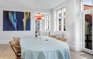 Enjoy meals in this dining area with a round table and six comfortable chairs.