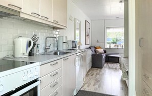 Fridge, microwave, stovetop, cookware/dishes/utensils