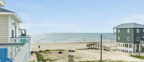 On the beach, sun-loungers, beach towels