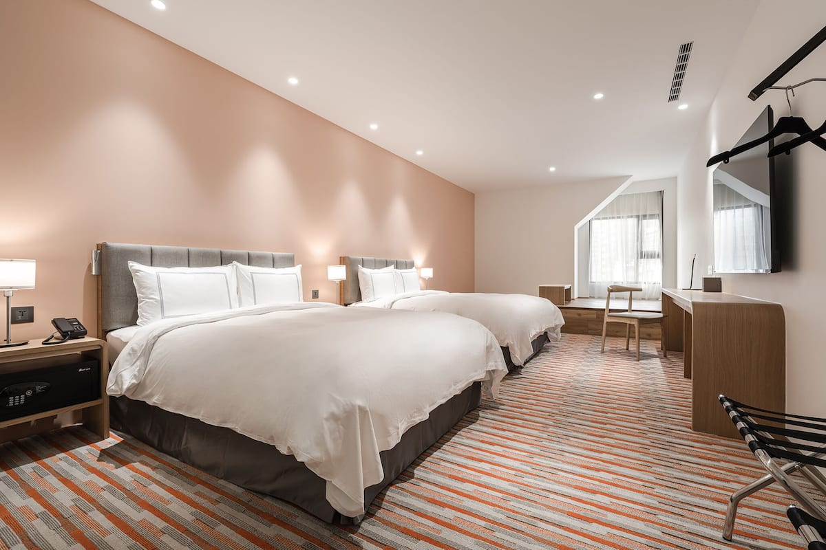 Deluxe Quadruple Room (with window) | In-room safe, free WiFi, bed sheets