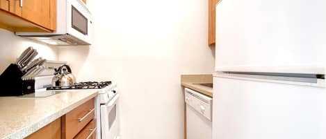 Coffee/tea maker, fridge, microwave, oven