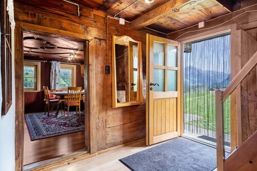 Maison de vacances "Knusperhäuschen Höfen-Hüsle" avec vue sur les montagnes