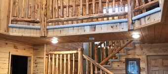 Log home nestled in tall pines near Norway Lake