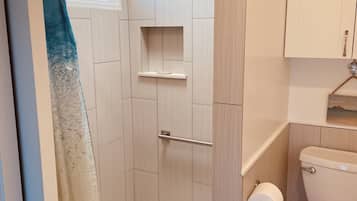 Shower, hair dryer, towels, toilet paper