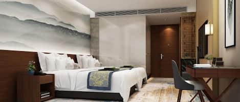 A modern hotel room with a large bed, a desk, and a wall-mounted TV.
