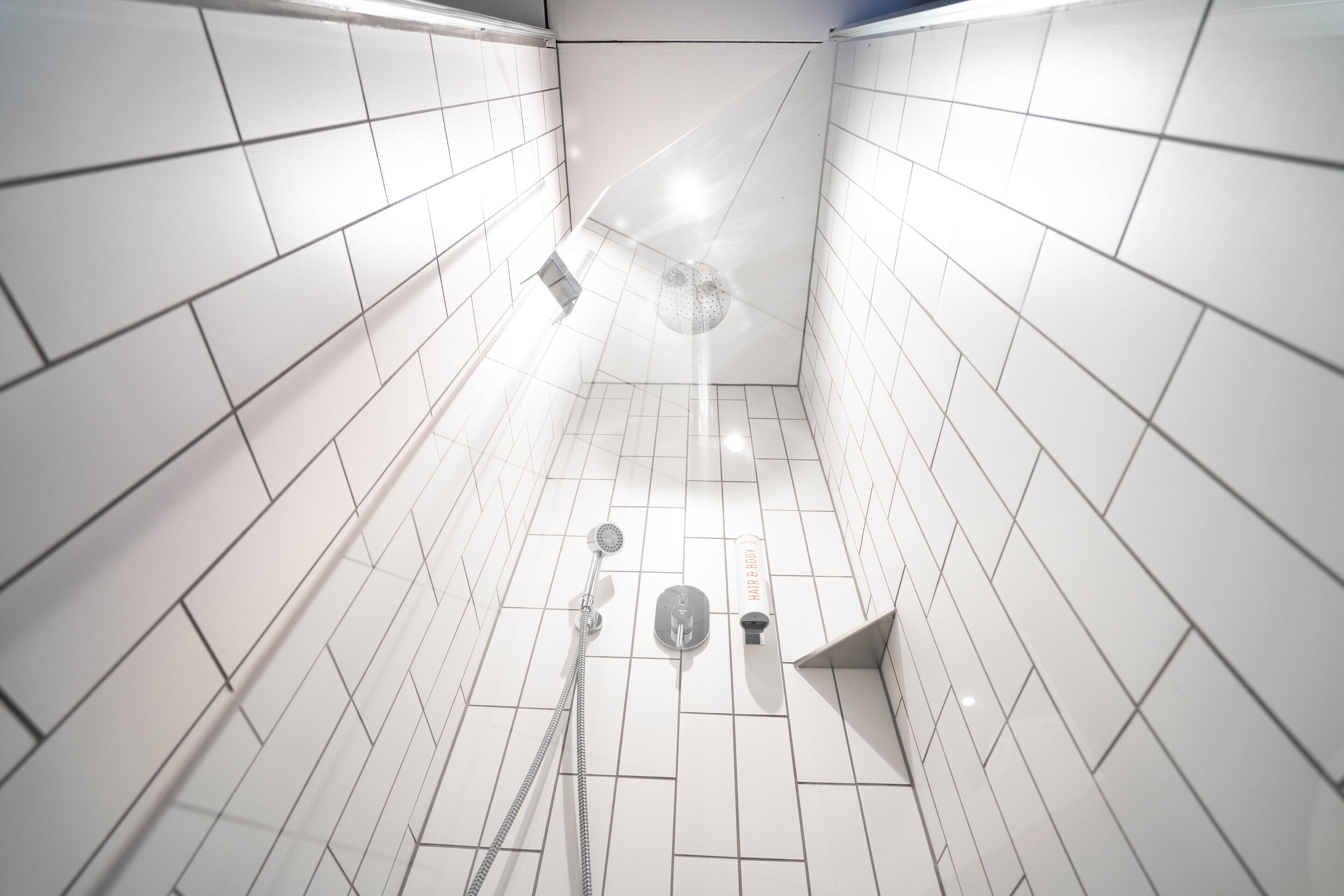 business double room | bathroom | shower, rainfall showerhead, hair dryer, towels