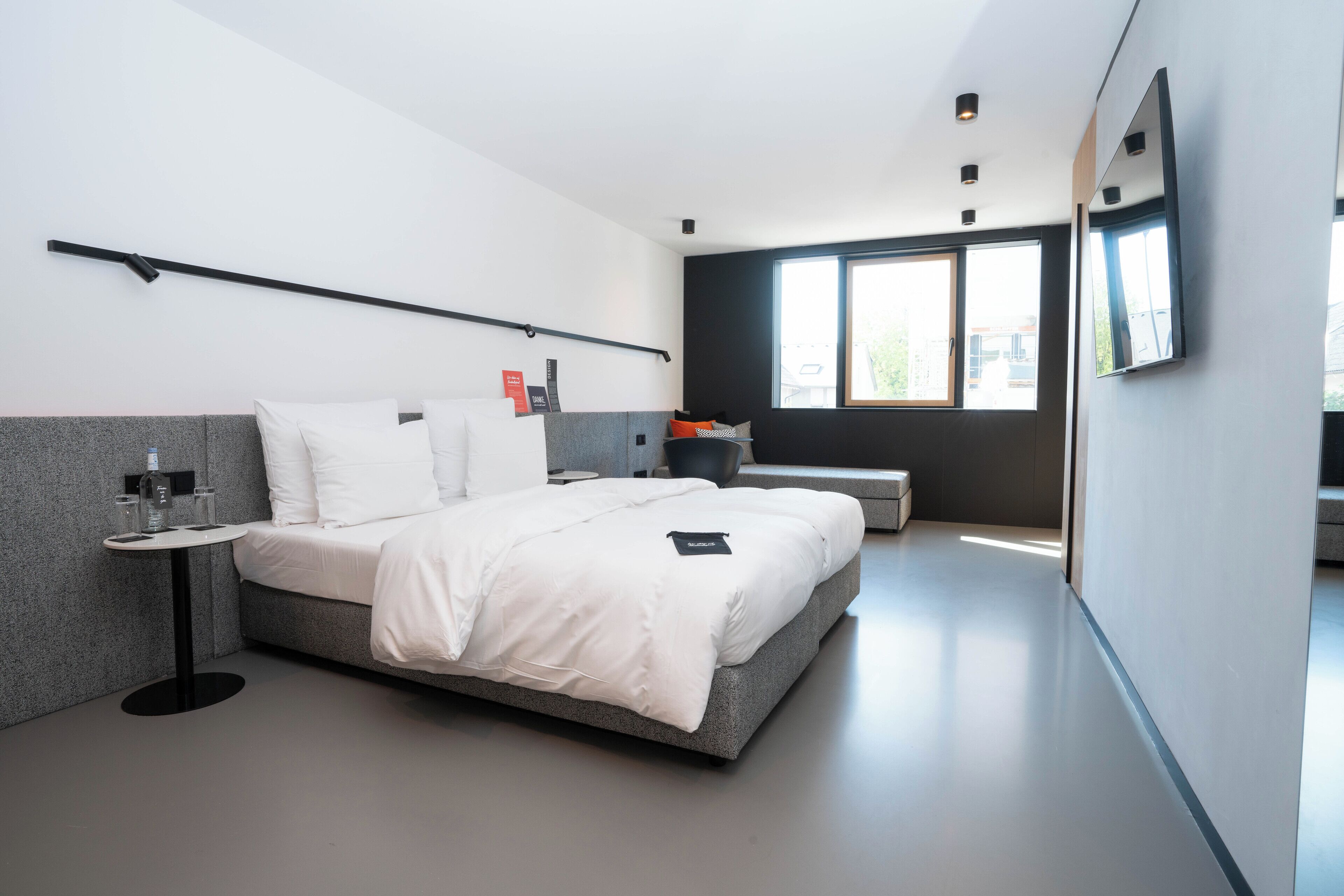 Premium bedding, down comforters, in-room safe, soundproofing