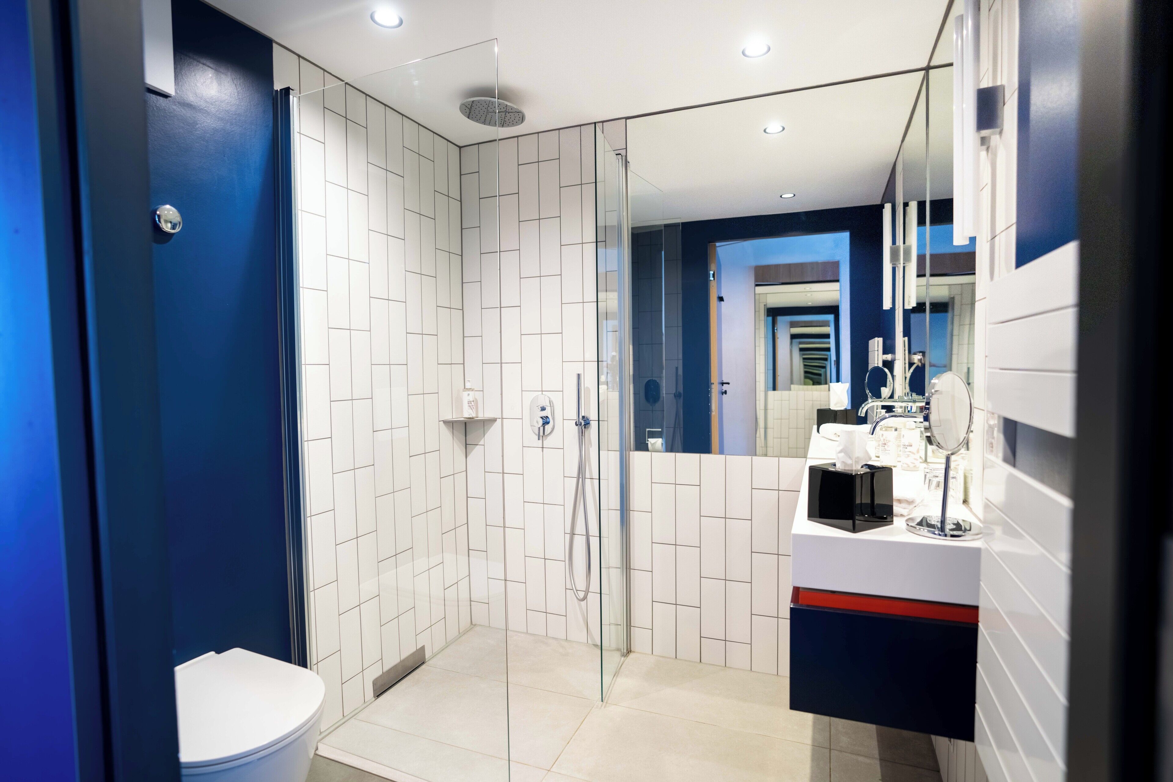 shower, rainfall showerhead, hair dryer, towels