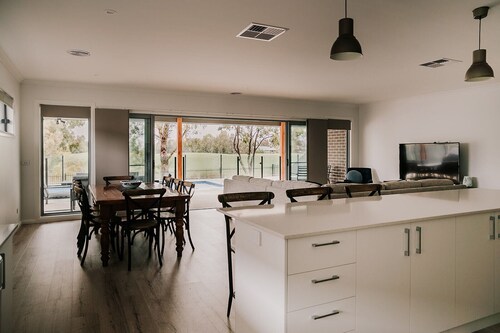 A Brand New Home with a Pool overlooking The Black Bull Golf Course