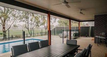A Brand New Home with a Pool overlooking The Black Bull Golf Course
