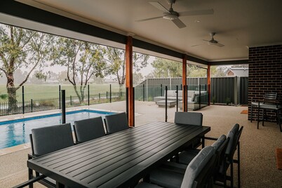A Brand New Home with a Pool overlooking The Black Bull Golf Course