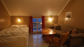 Studio, 1 grand lit | Salle de séjour