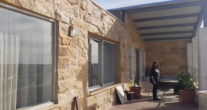 Penthouse (apartment) overlooking Jordan valley is located in Amman.