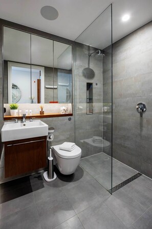 Bathtub, hair dryer, towels