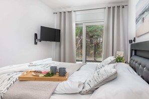 1 habitación, tabla de planchar con plancha, wifi y ropa de cama 