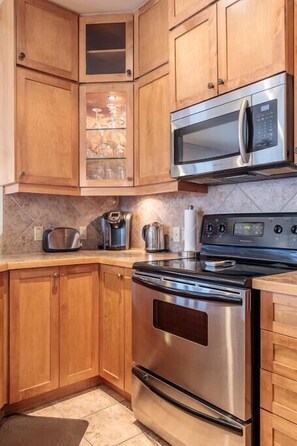 Fridge, microwave, oven, stovetop - McAuley Manor - Mountain Views, Downtown Location (Canmore)