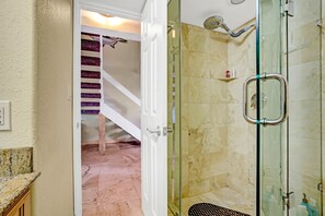 Bathtub, hair dryer, towels, soap