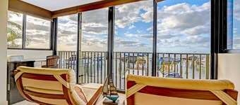 Rare Bayfront End Unit Moon Bay 2BR w/ Boat Slip, Pool, Beach & Sunset Views