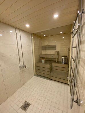 City Apartment | Bathroom | Shower, towels - 1BR home with Seaview Sauna and Balcony (Helsinki)