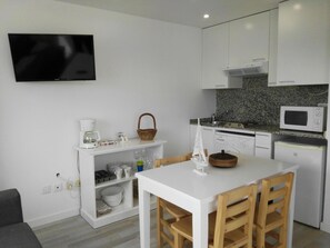Fridge, microwave, coffee/tea maker, toaster