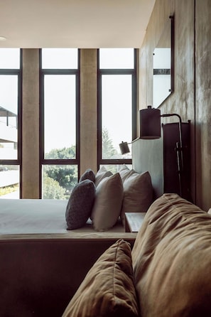 Suite Junior | 1 kamar tidur, seprai premium, selimut bulu angsa, dan brankas