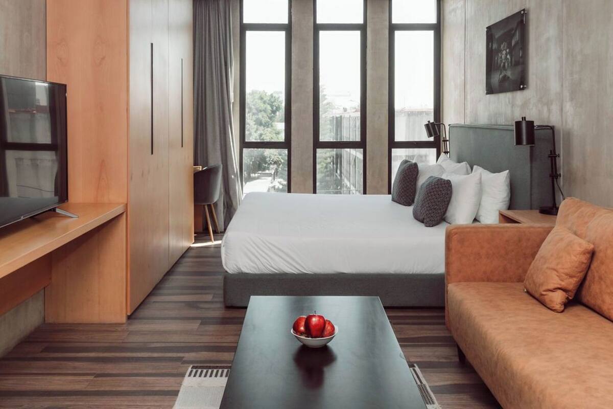 Suite Junior | 1 camera, biancheria da letto di alta qualità, copriletto in piuma