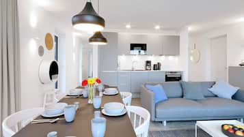 Condo superior | Área de sala de estar