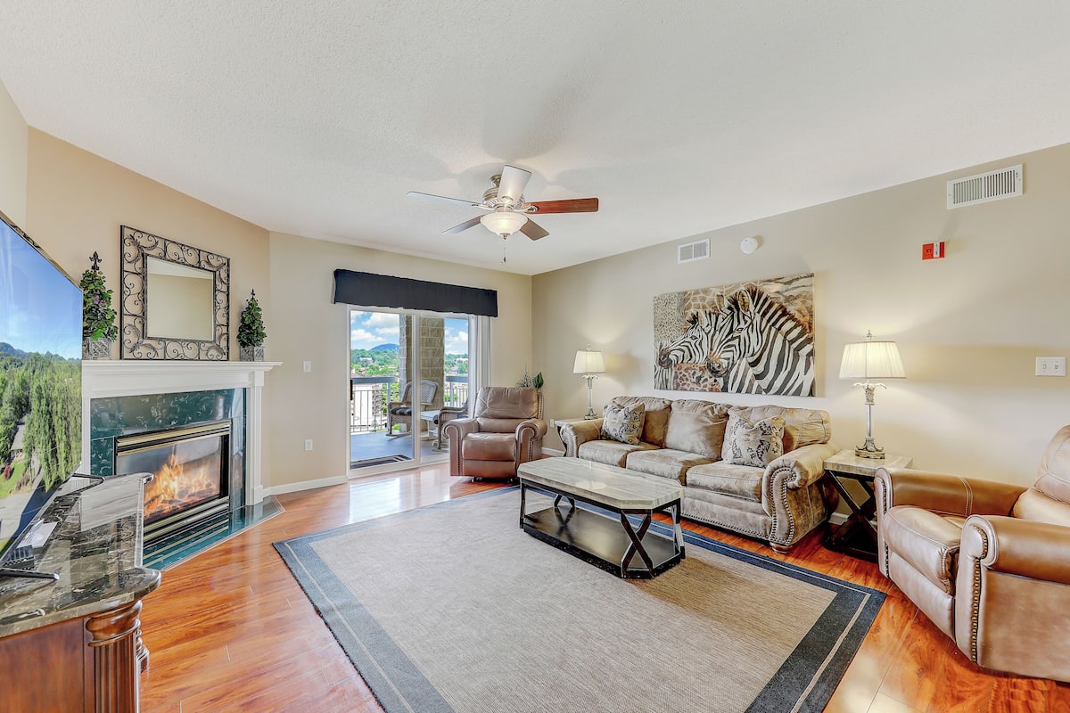 Condo (213 - City Escape - No Pets Allowed) | Living area | TV, fireplace