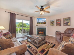 Condo (#513 - No Pets) | Living area | TV, fireplace