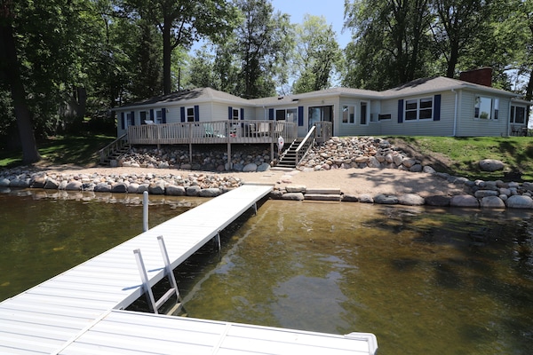 View of Pine Lake cottage from Dock looking toward beach.