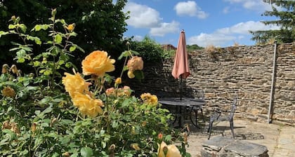 A wonderful stone cottage sleeps up to 5, is set in a quiet lane yet near to shops, lake etc.