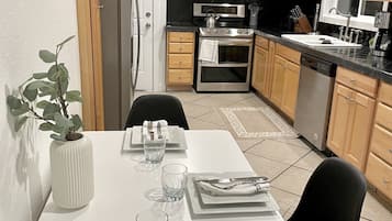 Coffee/tea maker, fridge, microwave, oven