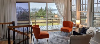 Enjoy elegant comfort with breathtaking water views on grand property