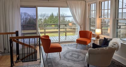 Enjoy elegant comfort with breathtaking water views on grand property