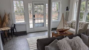 Smart TV, fireplace, table football, books